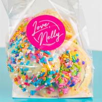 Half Dozen Besitos · Sweet, buttery, and highly addictive. Half dozen cookies covered in Love, Nelly signature sp...