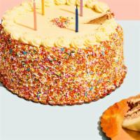 Birthday Cake Slice · Vanilla frosting with bright orange and blue sprinkles covering 3 layers of perfectly dense ...