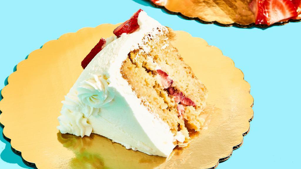 Tres Leches Cake Slice · A perfect cake for all occasions! We drench our famous vanilla cake with 3 types of milk and then cover it in homemade whipped cream and fresh strawberries.