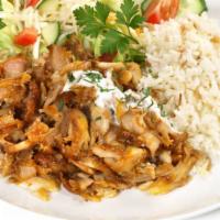 Chicken Over Rice · Fresh chicken with onions, lettuce, hot sauce, and optional white sauce.