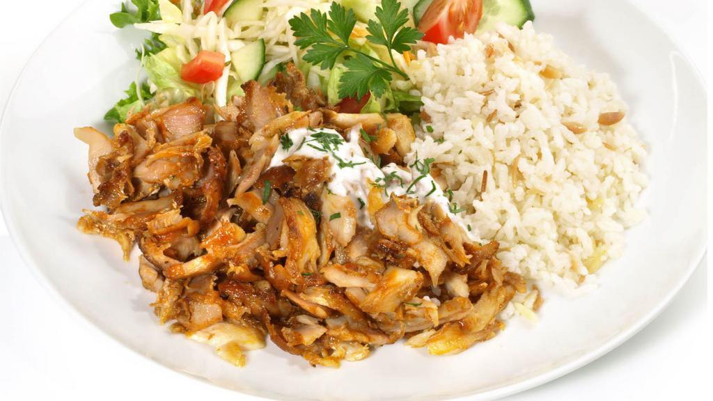 Chicken & Lamb Over Rice Combo · Delicious lamb and chicken over hot rice with cooked onions, fresh lettuce, hot sauce, and optional white sauce.