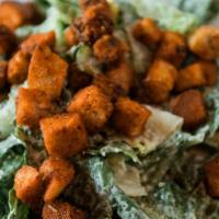 Caesar Salad · romaine lettuce with our homemade croutons.