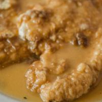Chicken Francese · breast of chicken dipped in egg & flour, sautéed in a white wine, lemon & butter sauce.