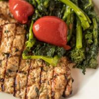 Grilled Chicken Breast · marinated with fresh herbs & served with broccoli or broccoli rabe & cherry peppers.