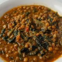 Lentil Soup · Our homemade vegetable broth with lentils, onions, carrots, & spinach.