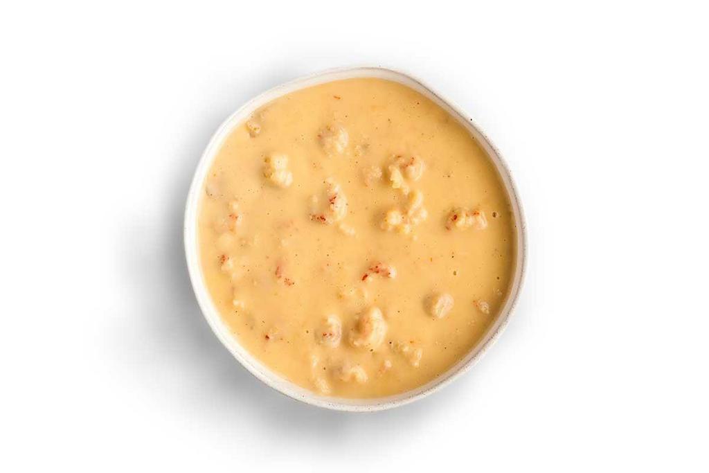 Lobster Bisque · Mellow, real-cream soup with lobster, crawfish, butter and a hint of sherry.