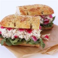 Modern Tuna · tuna, pickled onions and lively greens on focaccia bread