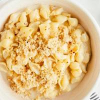 Classic Mac · creamy white cheddar sauce on shells and pie crust topping