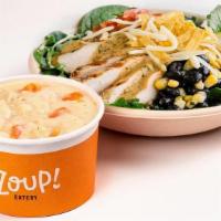 Soup And Salad · Your choice of soup, a hunk of freshly baked bread and a made-to-order salad on a bed of bab...