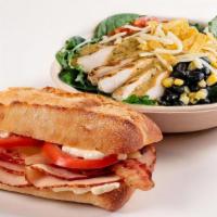 Salad And Sandwich · Your choice of made-to-order sandwich paired with a fresh salad on a bed of baby kale, baby ...