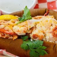 Buttah Lobster Roll Sandwich · Fresh butter roll, lettuce, pickled Asian veg, onion, cilantro, Asian Cajun butter sauce. **...