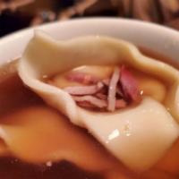 Wonton Soup · Seasoned broth with filled wonton dumplings.