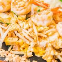Shrimp Pad Thai · Thai rice fettuccine.