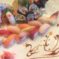 Sushi For 2 · 12 pcs. Of assorted sushi & 2 roll of chef's choice.