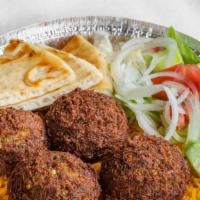 Falafel Platter · Crispy homemade falafel..100% vegetarian
 made from a perfect blend of beans seasoned with f...