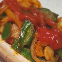 Italian Hot Dog  · Italian hot dog.  
Grilled hot dog with onion, peppers,potato  
Mustard and ketchup