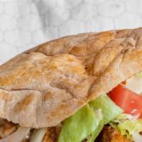 Chicken Kebab  Sandwich · Grilled marinated chicken cubes served on pocket pita ,onion, lettuce, tomato and topped wit...