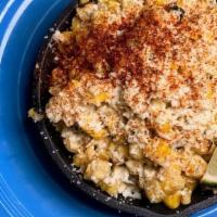Mexican Street Corn · Vegetarian. Off cob, chile rub, lime cotija garlic crema.