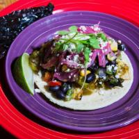 Sprouts · Brussels sprouts, black bean corn salsa, Cortina cheese, pickled red onion.