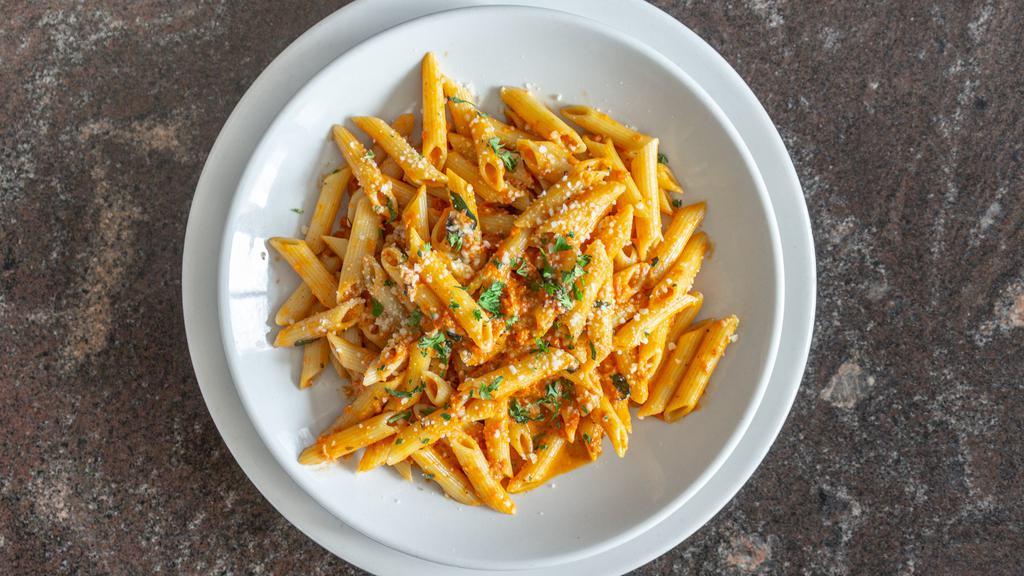 Penne Ala Vodka · Vodka cream sauce with Romano cheese, diced bacon, and shallots. Served with small house salad.