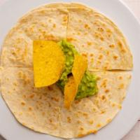 Cheese Quesadilla · Flour tortilla filled with cheese. Topped with guacamole.