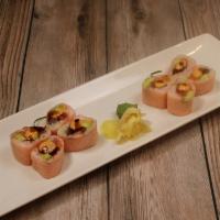 Sweet Heart Roll · Fresh tuna, salmon, kani, mango, avocado, cucumber, wrapped in soy paper, topped with spicy ...