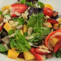 Strawberry Mango Salad · Mixed greens, arugula, mango, strawberry, red onions, shredded white radish, almonds, tropic...