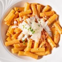 Vodka Rigatoni · Pink vodka cream sauce with prosciutto.