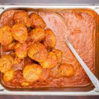 In House Meatball Parmesan · Homemade marinara sauce and melted mozzarella.
