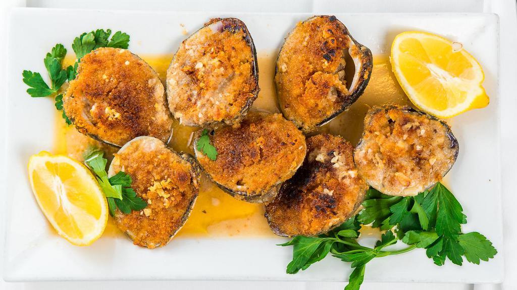 Baked Clams · Whole baked littleneck clams.