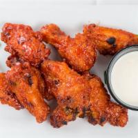 Buffalo Or Bbq Wings (9) · Classic style chicken wings tossed in our own zesty hot or BBQ sauce.