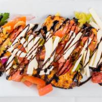 Chicken Bruschetta · Fried or grilled white meat chicken topped with plum tomatoes, red onion & fresh mozzarella.