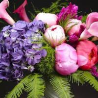 Amethyst Peonies · Purple hydrangea, pink peonies, pink Callas, and variety of greenery in a marble vase. Gorge...