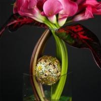 Calla Intrigue · Contemporary flower arrangement featuring calla lilies artistically designed in a structural...