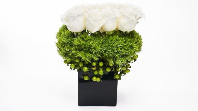 Coco · These beautiful white dozen roses, with green berries and dianthus, is a wonderful mother’s day gift.
