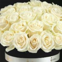 Marseille · Gorgeous two dozen of white roses arranged in a trendy flower hat box.