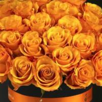 Lyon · Gorgeous two dozen of fresh orange roses stylishly arranged in a flower hat box.