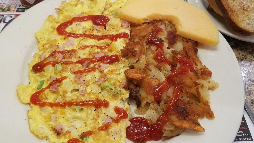 Western Omelette · With ham, peppers, and onions.