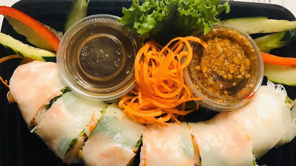 Thai Shrimp Summer Rolls (1 Rolls) · Lettuce, carrot, rice vermicelli, tofu, beansprouts, cucumber, shrimp, garnished with mint leafs, wrapped with fresh rice paper, and topped with tamarind sauce.