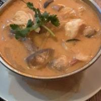 Tom Yum · Gluten Free. Thai hot and sour soup with mushroom, onion, Napa cabbage, carrot, cilantro, sw...