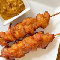 Nana Chicken Satay · Gluten-free, All-natural chicken marinated with Thai spices and coconut cream, peanut sauce.