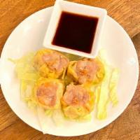 Chicken Mixed Shrimp Dumpling · All natural chicken, shrimp, mushrooms, carrot, scallion, Thai ginger vinaigrette sauce.