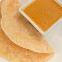 Roti Bread With Curry · Vegan. Grilled thin roti bread, coconut yellow curry dipping.