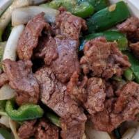 Black Pepper Beef · Sauteed beef marinade in a fresh black peppe, white onion, bell pepper sauteed perfection.