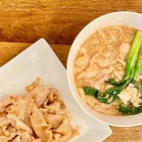 Lad Nah · Wok fried broad rice noodle in Thai-style soy bean gravy sauteed with egg and Chinese brocco...
