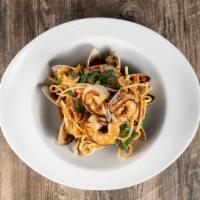 Linguine With Shrimp & Clams · Toasted garlic, plum tomatoes, and baby spinach.