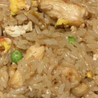Chicken Fried Rice · Fried rice with chicken, peas, carrots and egg.