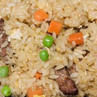 Beef Fried Rice · Fried rice with beef, peas, carrots and egg.