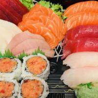 Sushi & Sashimi Combo · Six pieces of sushi, 12 pieces of sashimi with spicy tuna roll. Served with miso soup or sal...