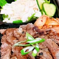 Bulgogi Beef Over Rice · -Grilled Beef with Bulgogi Sauce, Greens, Pickle Vegetables, Sprinkle Seaweed Sesame Powder ...